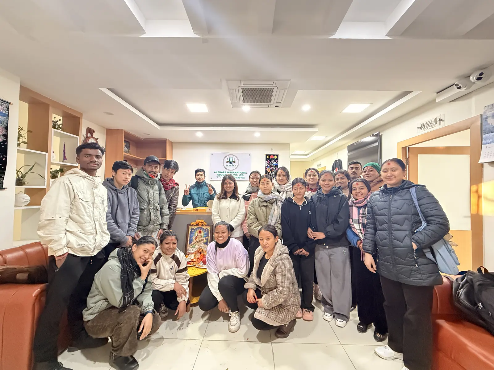 AIE students and staff at the Akshara office