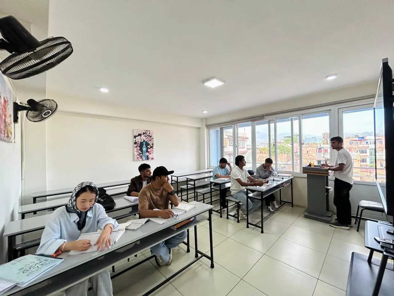 Students learning Japanese in class at Akshara