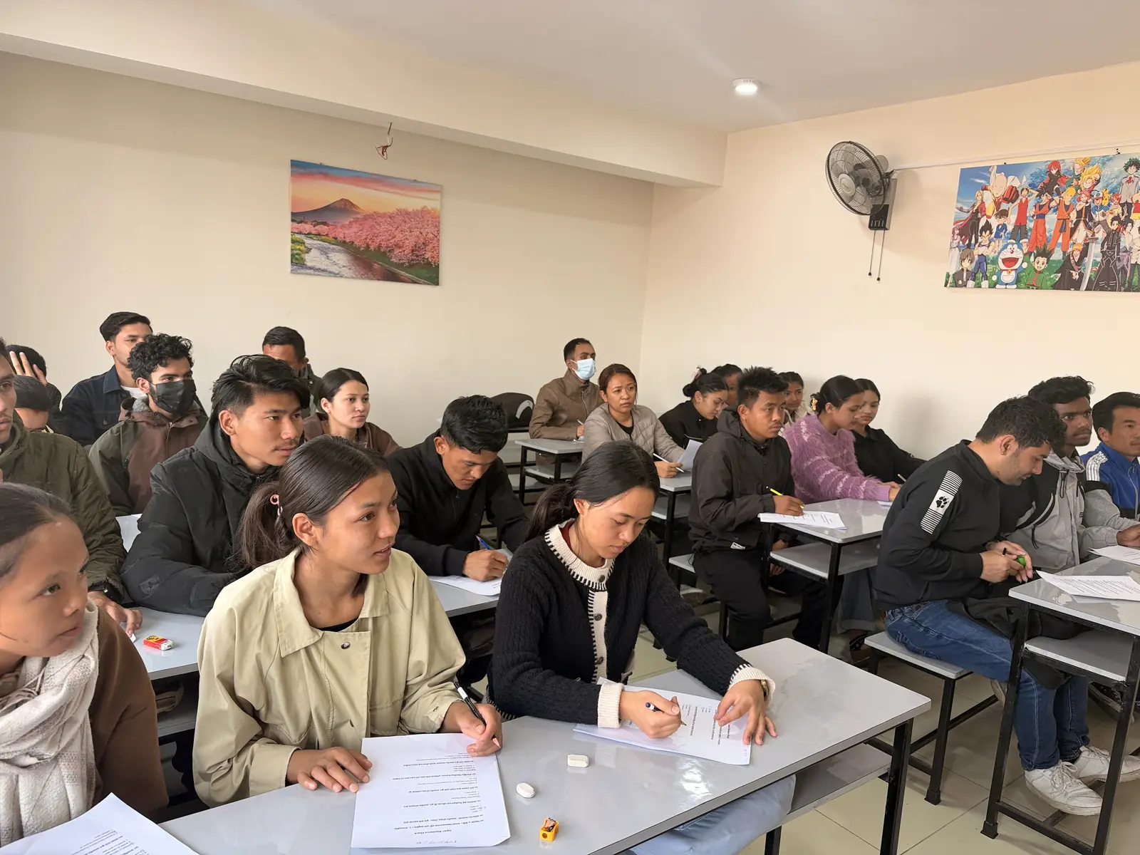 Students taking notes during a Japanese language class